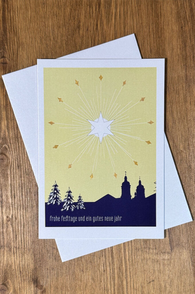 Weihnachtskarte «Tannenbäume unter Sternen»
